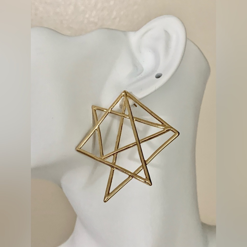 Asymmetrical gold large earrings